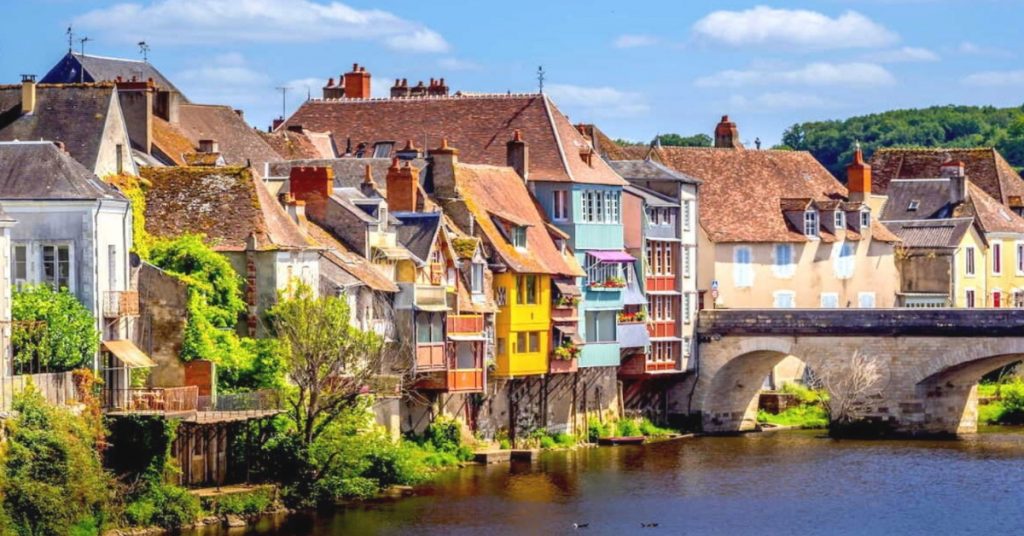 Colourful Gallery Houses on the water at Argenton-sur-Creuse France