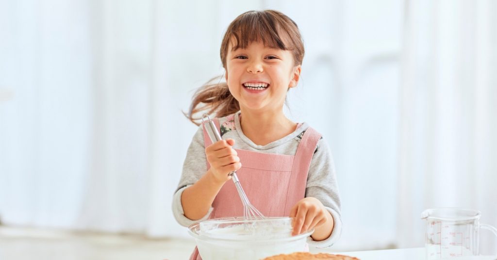 Girl baking a cake
