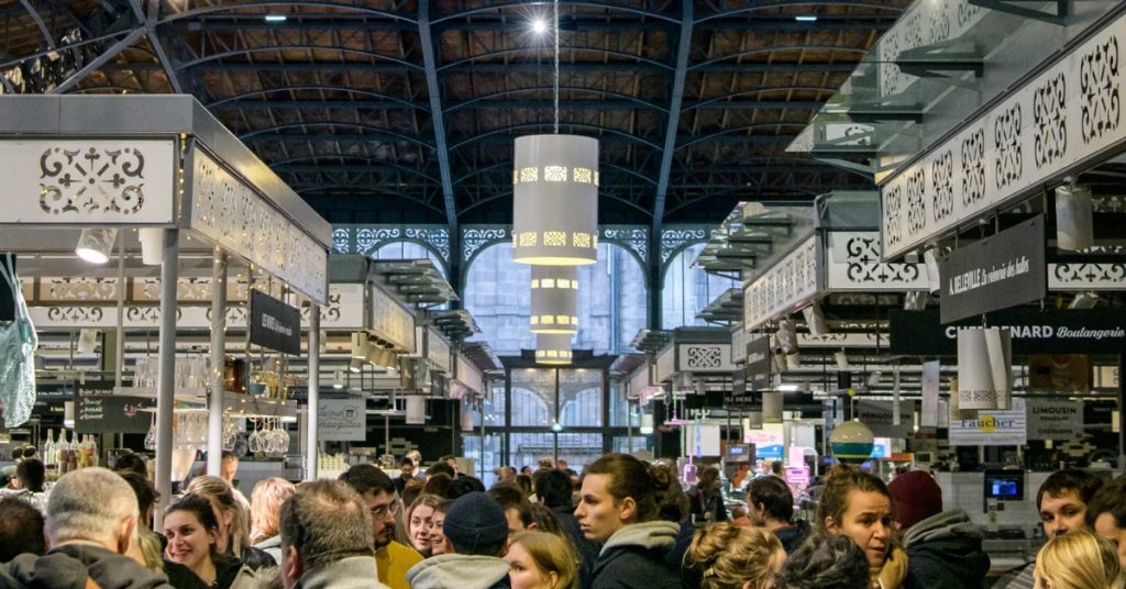 Crowds enjoying an evening at the Limoges Halles Centrales Night Market