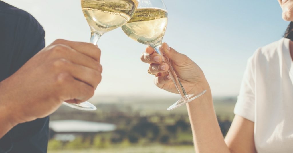 Couple raise a champagne toast