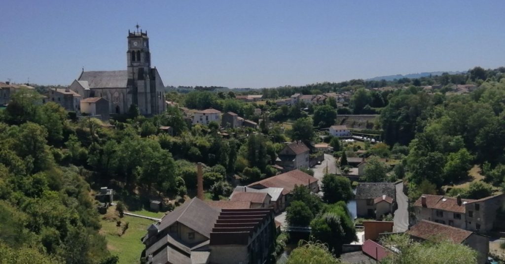 Scenic View of Bellac and its Stream, Church and Buildings on a Sunny Day